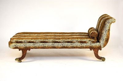 Lot 686 - An Empire style chaise longue with leopard print upholstery, together with an associated stool