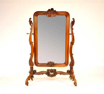 Lot 565 - A 19th century Austrian, Rococo style, walnut cheval mirror