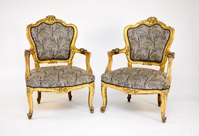 Lot 424 - A set of 4 Continental, Louis XV style gilded armchairs