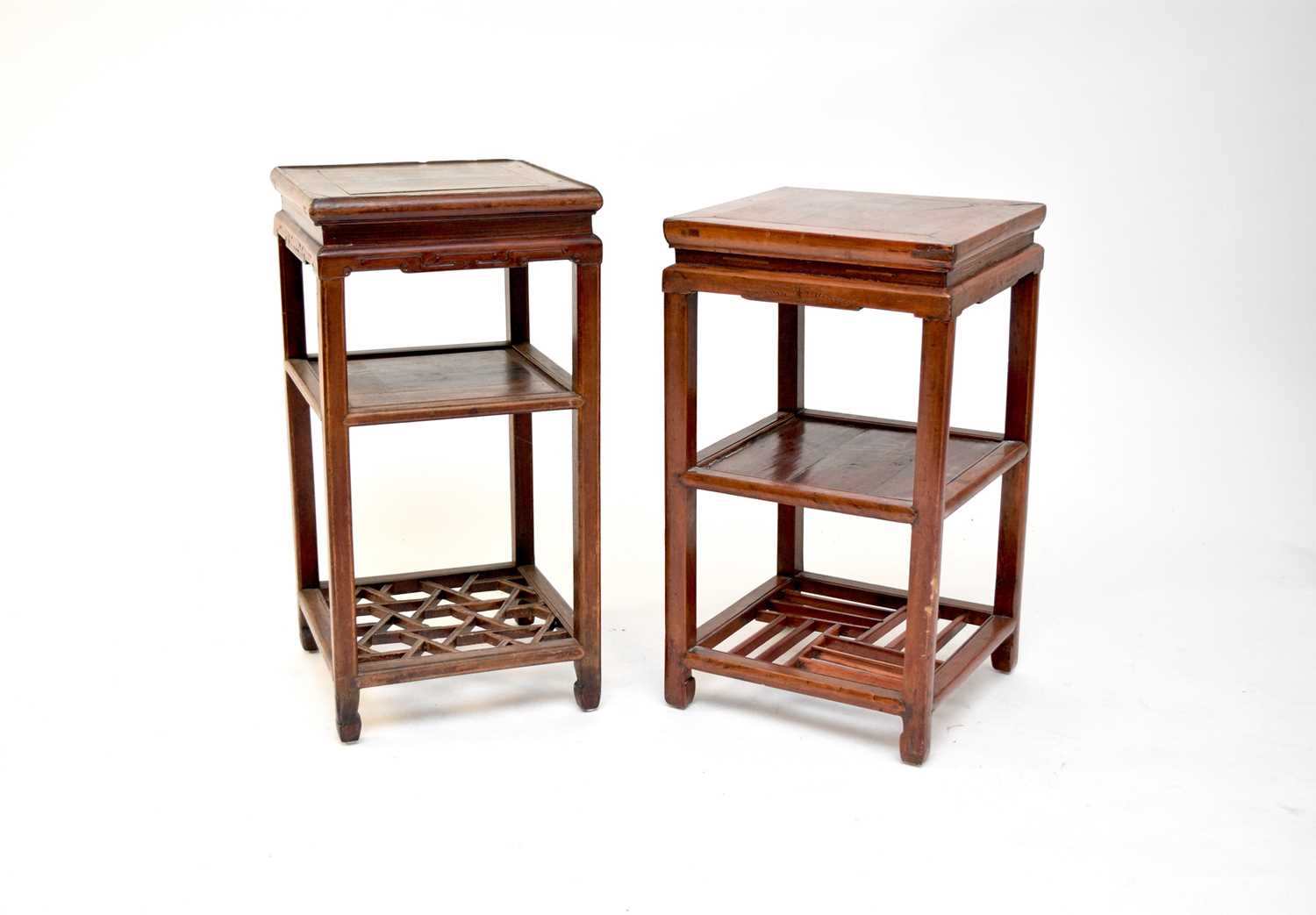 Lot 79 - Two similar Chinese hardwood urn stands