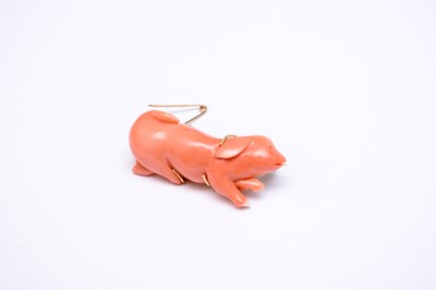 Lot 170 - A coral brooch in the form of a pig