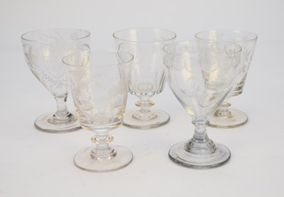 Lot 405 - Five George III engraved glass rummers