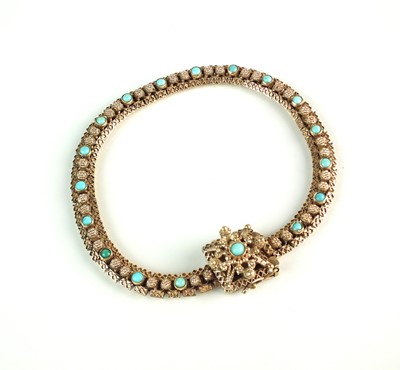 Lot 105 - A 9ct gold decorative turquoise set bracelet
