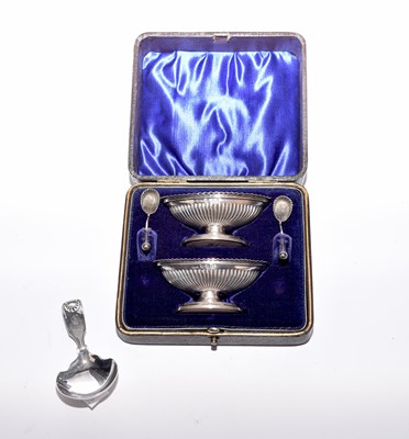 Lot 79 - A Victorian cased pair of silver salts and a caddy spoon