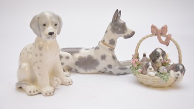 Lot 280 - Lladro Great Dane and 'Litter of Love' puppies in a basket