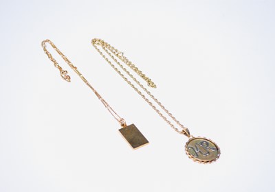 Lot 210 - Two 9ct gold pendants on chains