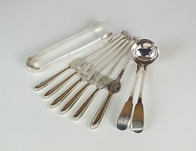 Lot 54 - A set of six silver lobster picks, two silver sauce ladles and a pair of silver sugar tongs
