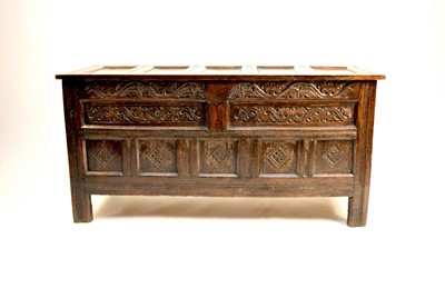 Lot 648 - A 17th century carved oak coffer