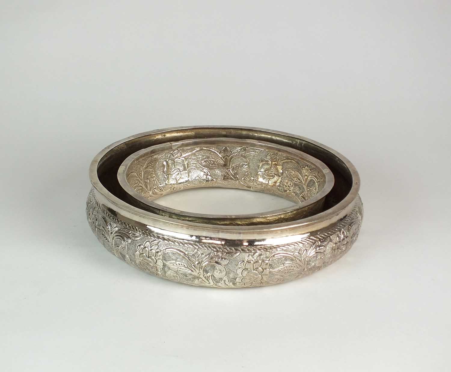 Lot 46 - A white metal Middle Eastern flower ring bowl