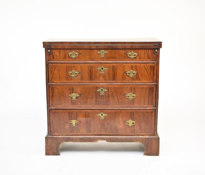 Lot 332 - An 18th century and later walnut veneered bachelors chest