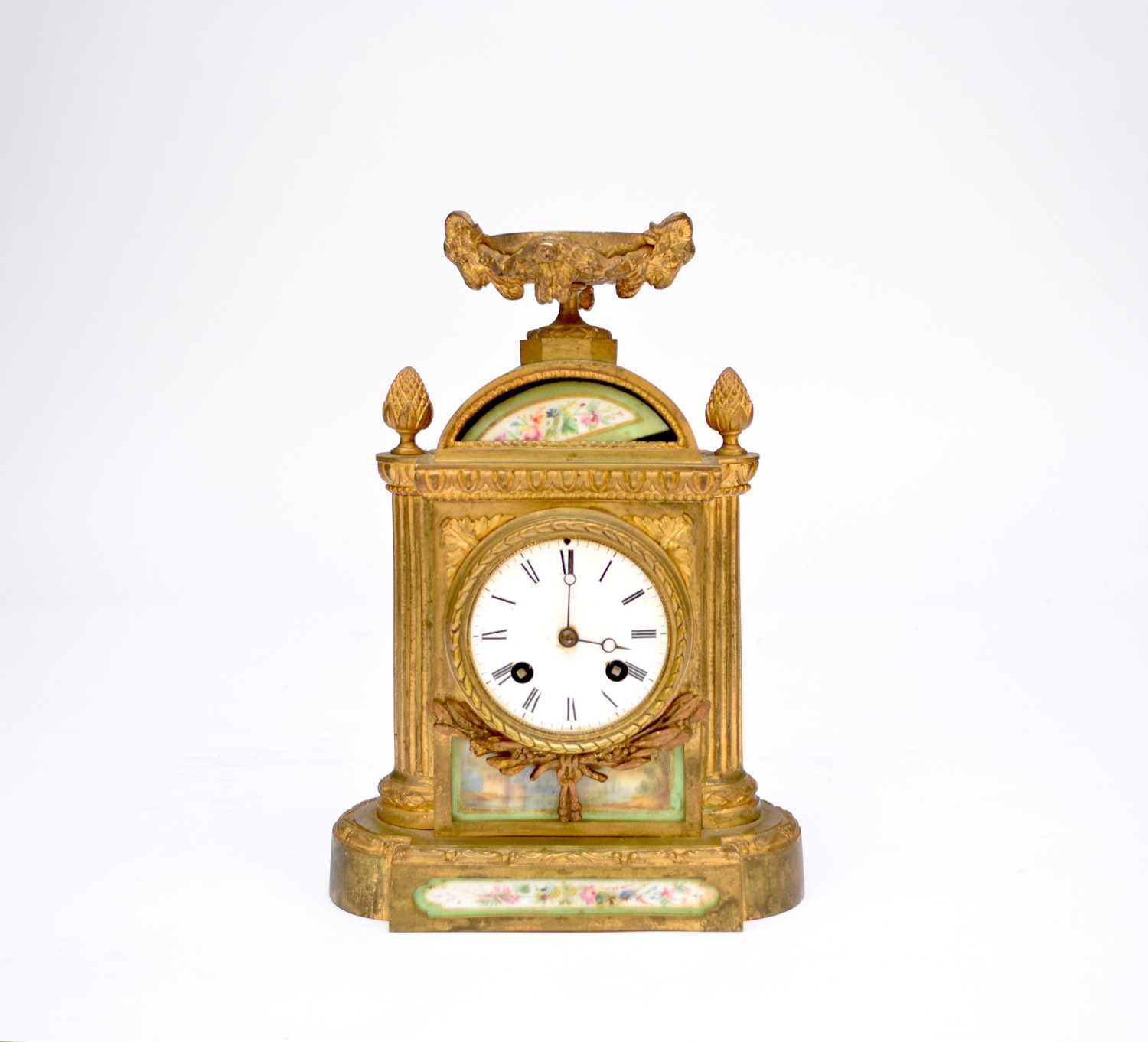 Lot 612 - A French gilt-metal mantel clock