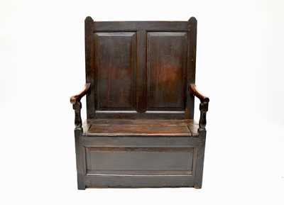 Lot 524 - A North Wales oak box settle