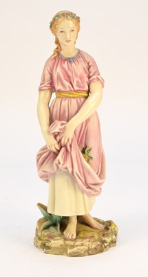 Lot 445 - A Royal Worcester model of a woman with a pineapple