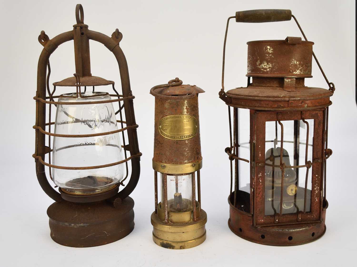 Lot 422 - First World War bunker or trench lantern, 'Bat' storm lantern and a miner's lamp