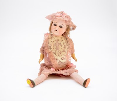 Lot 546 - A Loeffler & Diller bisque-headed doll