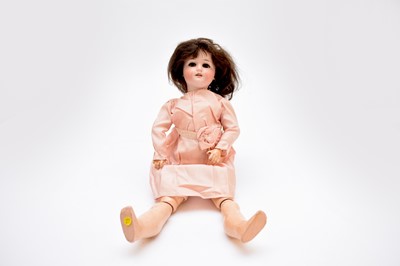 Lot 565 - A Schoenau & Hoffmeister bisque-headed doll