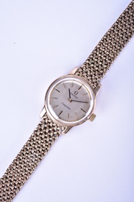 Lot 138 - Omega: A 9ct gold Ladymatic bracelet watch