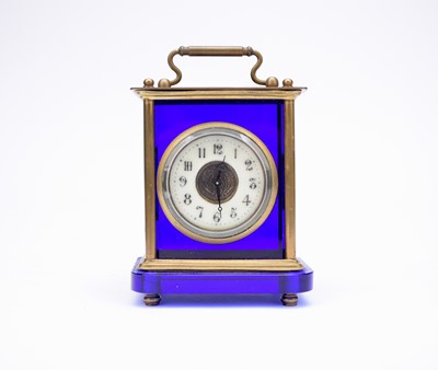 Lot 497 - A blue glass cased carriage timepiece