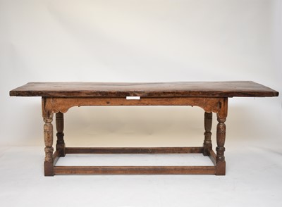 Lot 515 - An oak and fruitwood refectory dining table