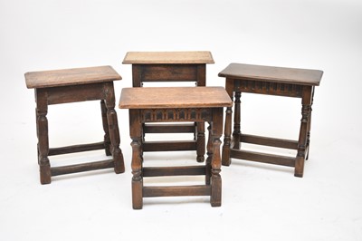 Lot 516 - A group of four joined oak stools