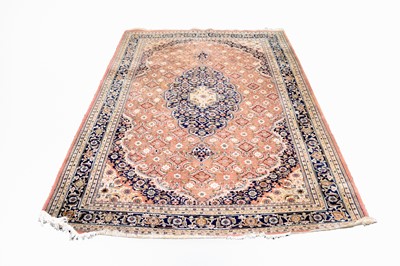 Lot 608 - A Tabriz pattern carpet