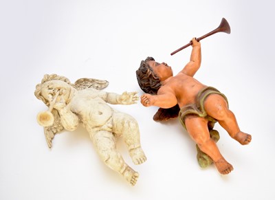 Lot 439 - A collection of painted composition figures of putti