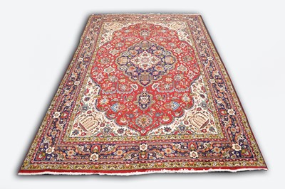 Lot 456 - A Tabriz pattern carpet