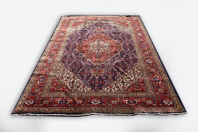 Lot 757 - A Tabriz pattern carpet