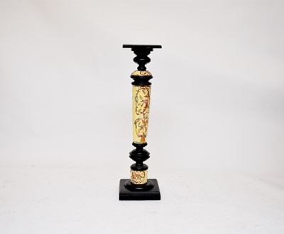 Lot 541 - A pottery and ebonised torchere stand