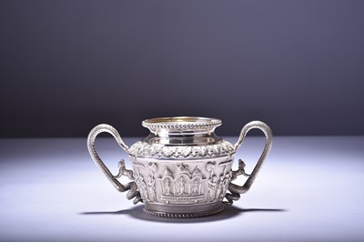 Lot 128 - A cased Anglo-Indian silver three-piece tea set by Peter Orr & Sons