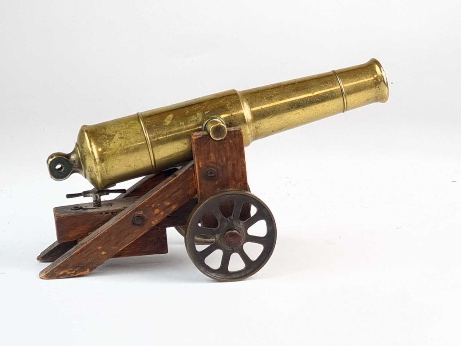 Lot Brass model of a cannon, 19th century