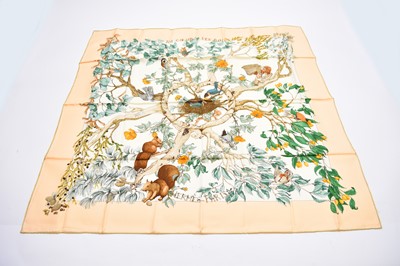 Lot 478 - A Hermes silk 'Au Coeur Des Bois' print scarf, with card slipcase