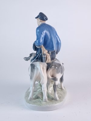 Lot 275 - Royal Copenhagen model of a boy leading two calves, modelled by Christian Thomsen