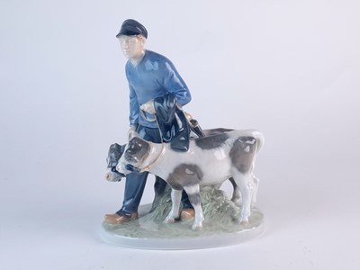 Lot 275 - Royal Copenhagen model of a boy leading two calves, modelled by Christian Thomsen