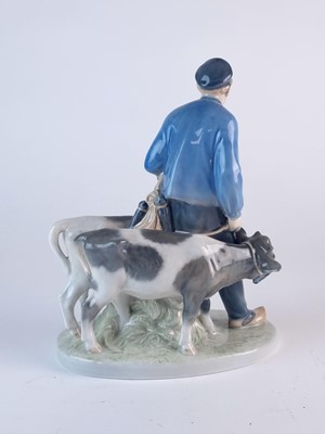 Lot 275 - Royal Copenhagen model of a boy leading two calves, modelled by Christian Thomsen
