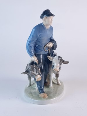 Lot 275 - Royal Copenhagen model of a boy leading two calves, modelled by Christian Thomsen