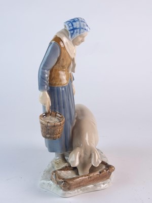 Lot 276 - Bing and Grondahl figure of an elderly woman with a pig