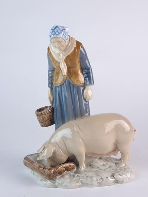 Lot 276 - Bing and Grondahl figure of an elderly woman with a pig