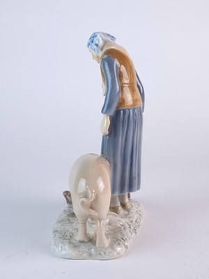 Lot 276 - Bing and Grondahl figure of an elderly woman with a pig