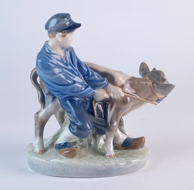 Lot 277 - Royal Copenhagen model of a boy pulling a calf by Christian Thomsen