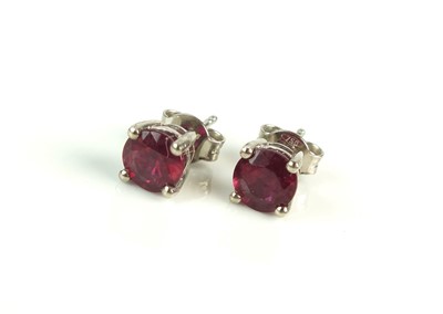 Lot 93 - A pair of ruby and earrings