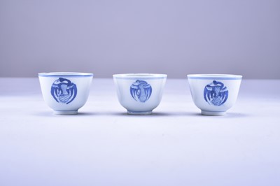 Lot 35 - An assembled group of Chinese blue and white bowls and a cup, 18th century