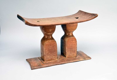 Lot 409 - An Ashanti wooden tribal stool, Ghana, West Africa