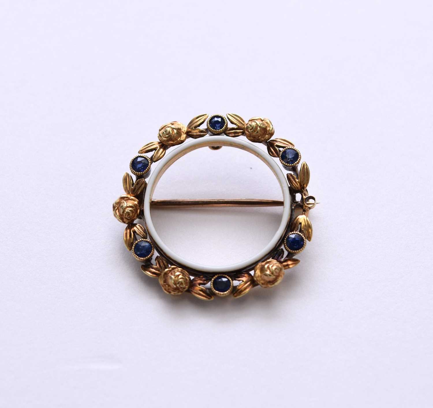 Lot 71 - A late 19th/early 20th century sapphire and enamel brooch
