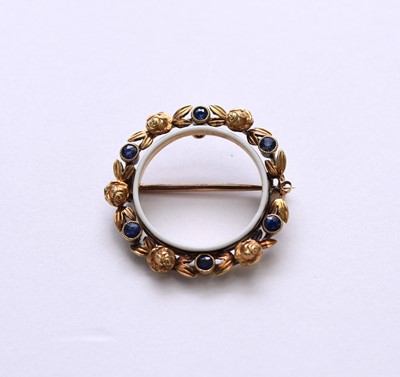 Lot 71 - A late 19th/early 20th century sapphire and enamel brooch