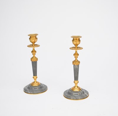 Lot 438 - A pair of gilt-metal and grey-veined marble candlesticks