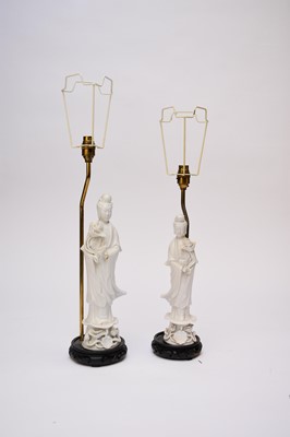 Lot 379 - Two Chinese blanc-de-chine figures of Guanyin converted to table lamps