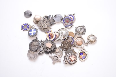 Lot 116 - A large collection of silver badges, brooches, fobs, coin mounts etc