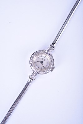 Lot 128 - Vertex Revue: A lady's 18ct white gold diamond-set watch on a 9ct bracelet