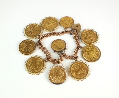 Lot 79 - A 9ct rose gold curb link bracelet with attached coins